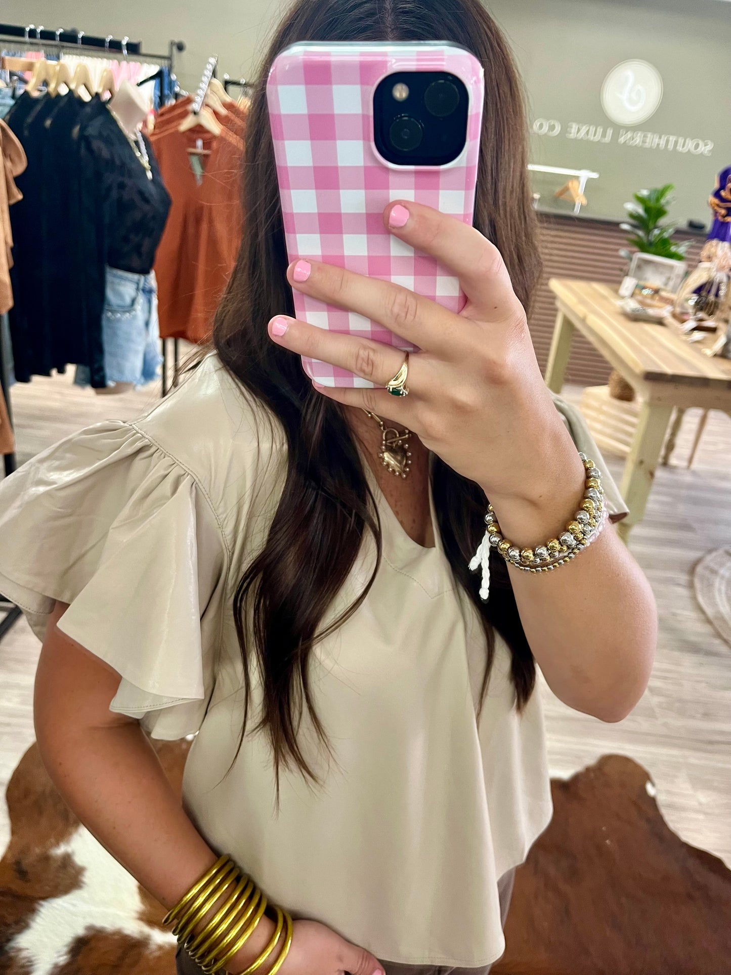 Ecru faux leather ruffle sleeve blouse