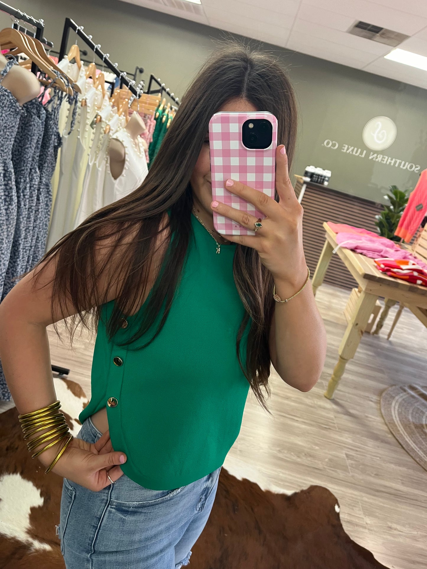 Green sleeveless sweater top
