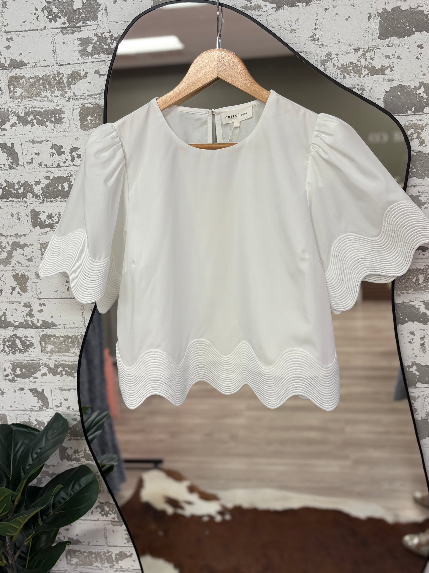 Women’s white wave trim blouse