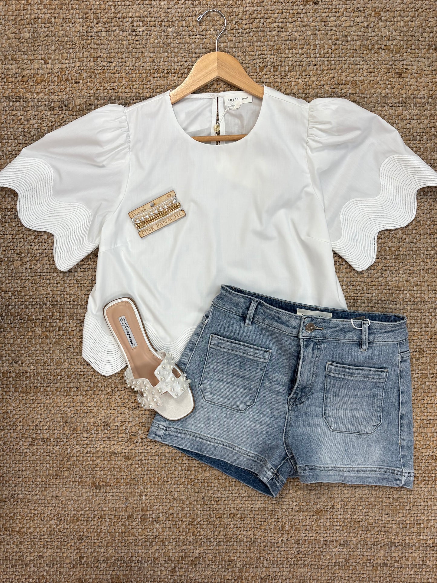Women’s white wave trim blouse