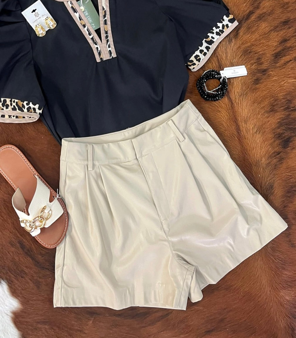 Ecru faux leather shorts